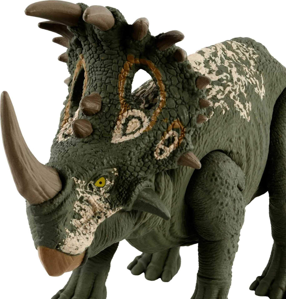 Mattel Jurassic World Sound Strike dinosaur figure, side view, ready to strike in dramatic pose.