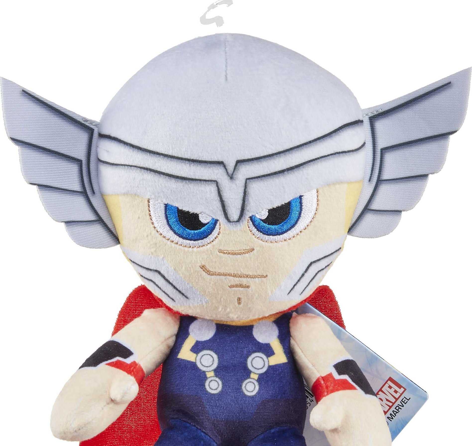 Close-up of Thor's costume details on the Mattel plush figure, premium textures.