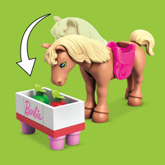 Brush accessory to simulate grooming routines with Barbie