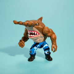 Mattel Street Sharks Jab bite action shows chomping jaws for dynamic play.