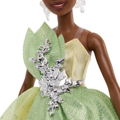 Mattel Tiana hair updo and tiara showcase gleaming accents and luxe styling.