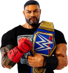 Mattel Roman Reigns entrance gear for dynamic posing and on-ring play.