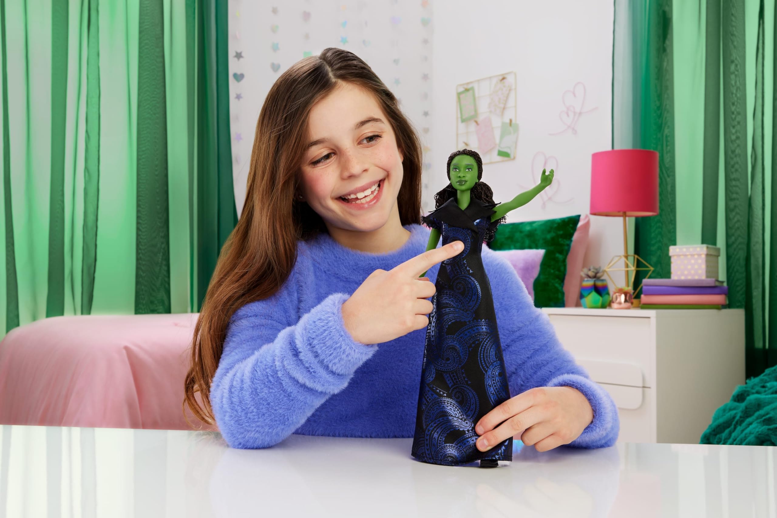 Mattel Wicked Elphaba doll shows long braided hair for dynamic storytelling and display.