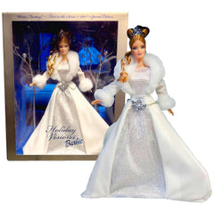 Mattel Winter Fantasy Barbie doll in a glittering silver gown with velvet coat, ideal for holiday display.