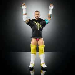 Mattel WWE Elite CM Punk figure in dynamic pose ready for action.