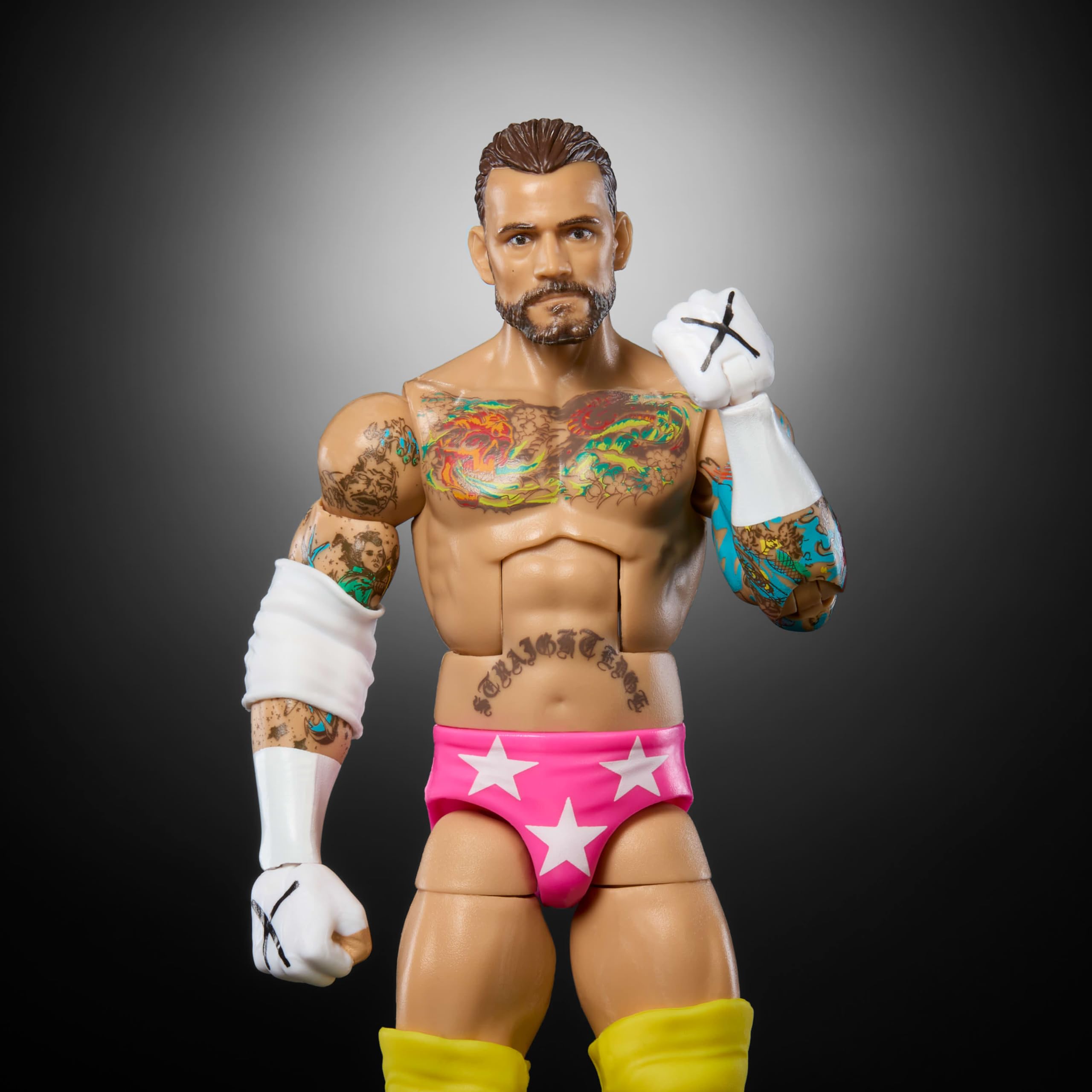 Mattel WWE Elite CM Punk with swappable hands for versatile play and display.