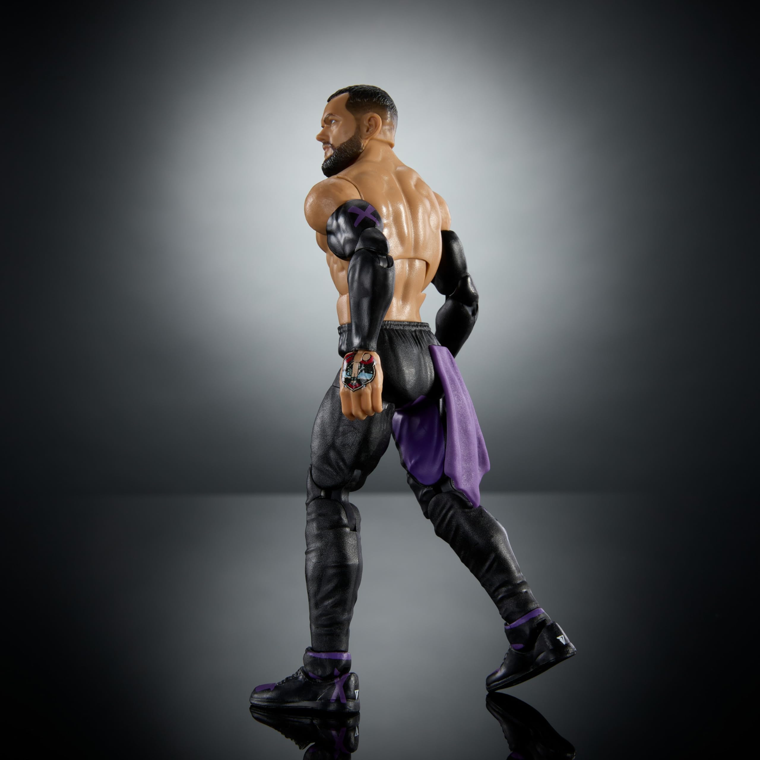Iconic accessories included for recreating signature moves and entrances.