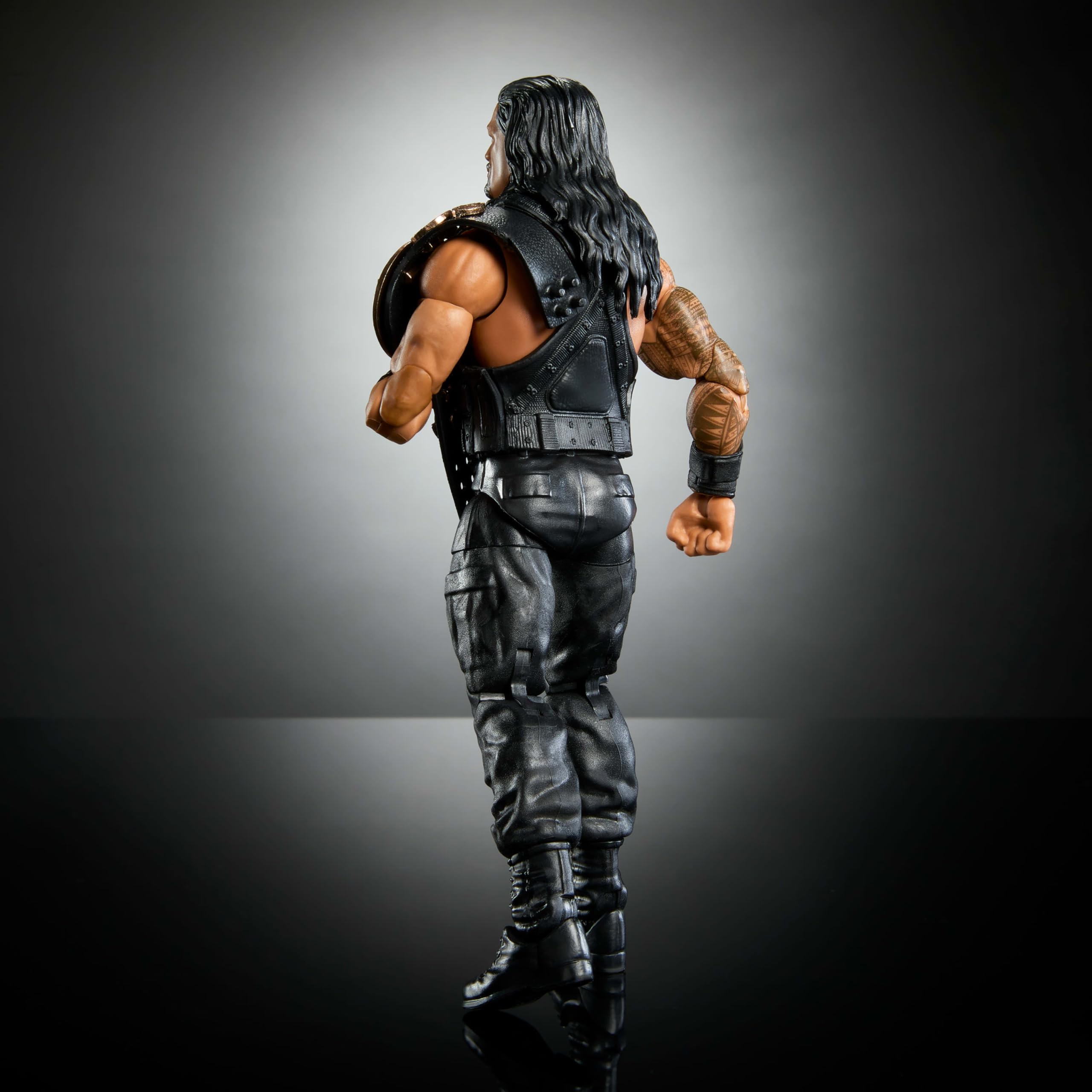 Mattel WWE Elite Roman Reigns packaging and stand ready for shelf display.