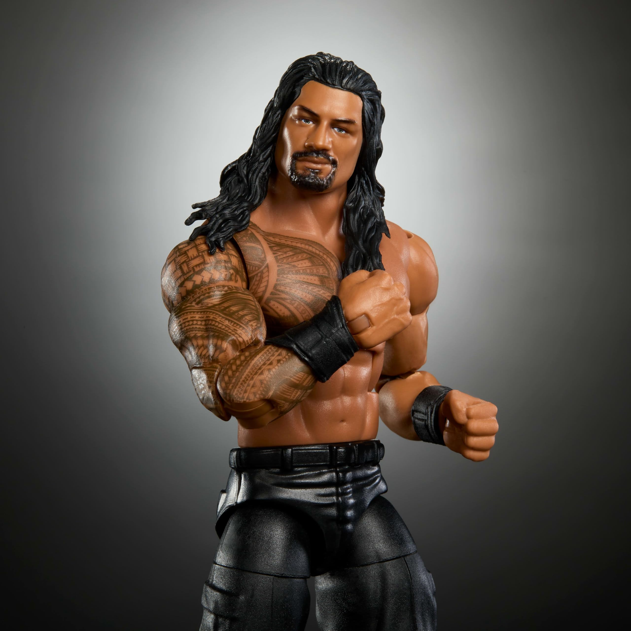 Mattel WWE Elite Roman Reigns swappable hands kit for varied storytelling.