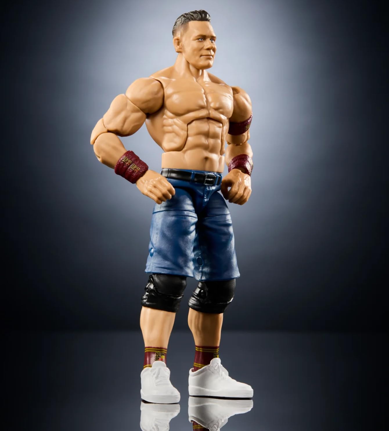 Mattel WWE John Cena Elite figure interchangeable hands and accessories expand play options.