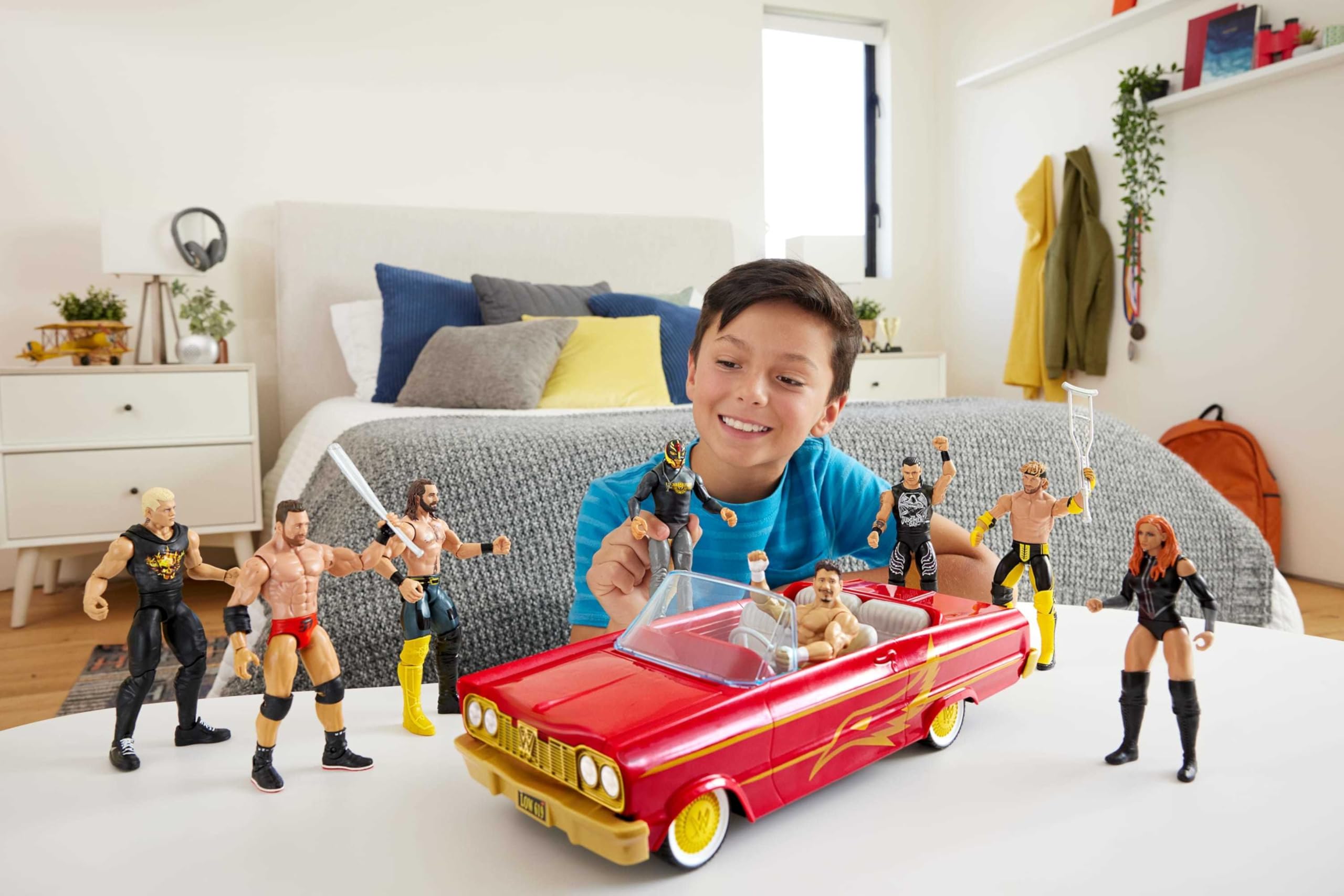 Mattel WWE Rey Mysterio Main Event figure with articulation ready for dynamic poses.