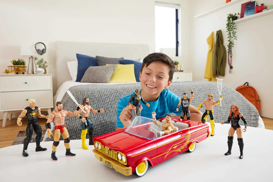 Mattel WWE Rey Mysterio Main Event figure with articulation ready for dynamic poses.