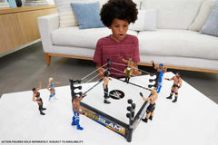 Mattel WWE Superstar Ring spring-loaded mat adds extra bounce.