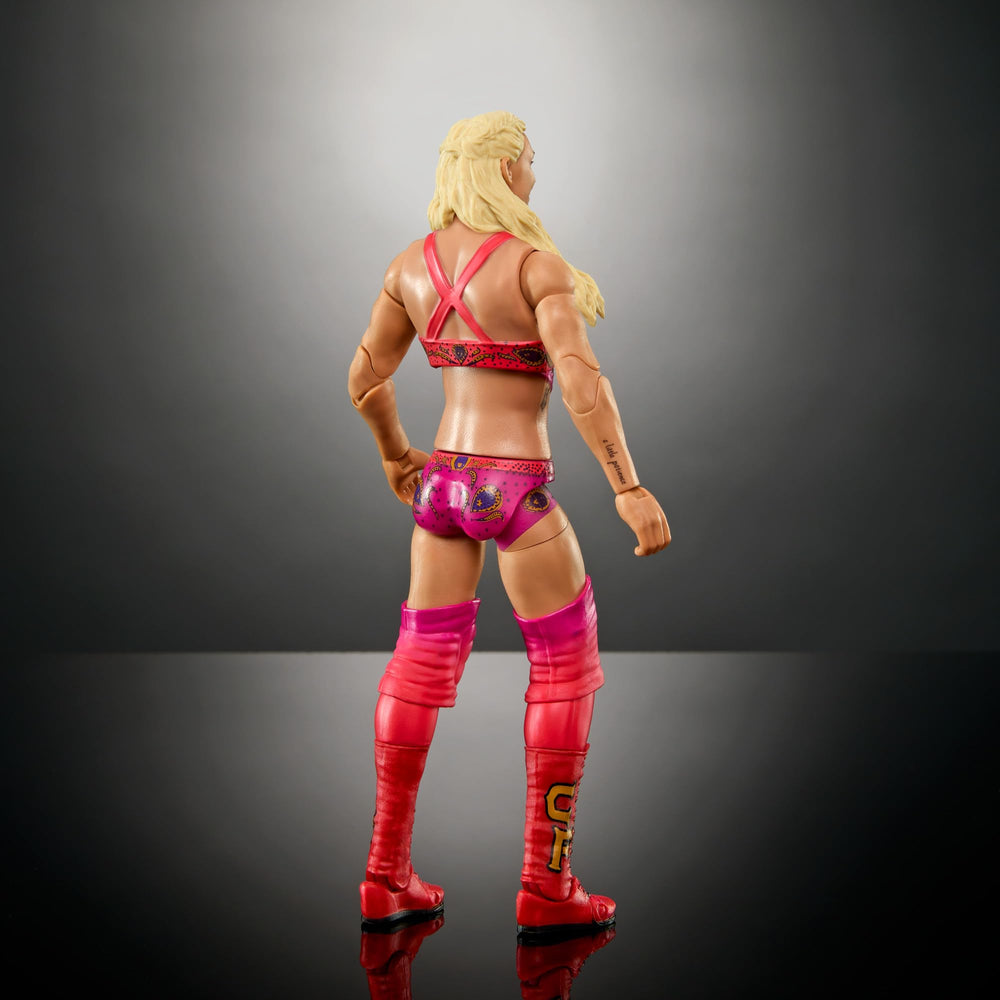 Packaging and presentation of Mattel WWE Ultimate Edition Charlotte Flair figure for collectors.