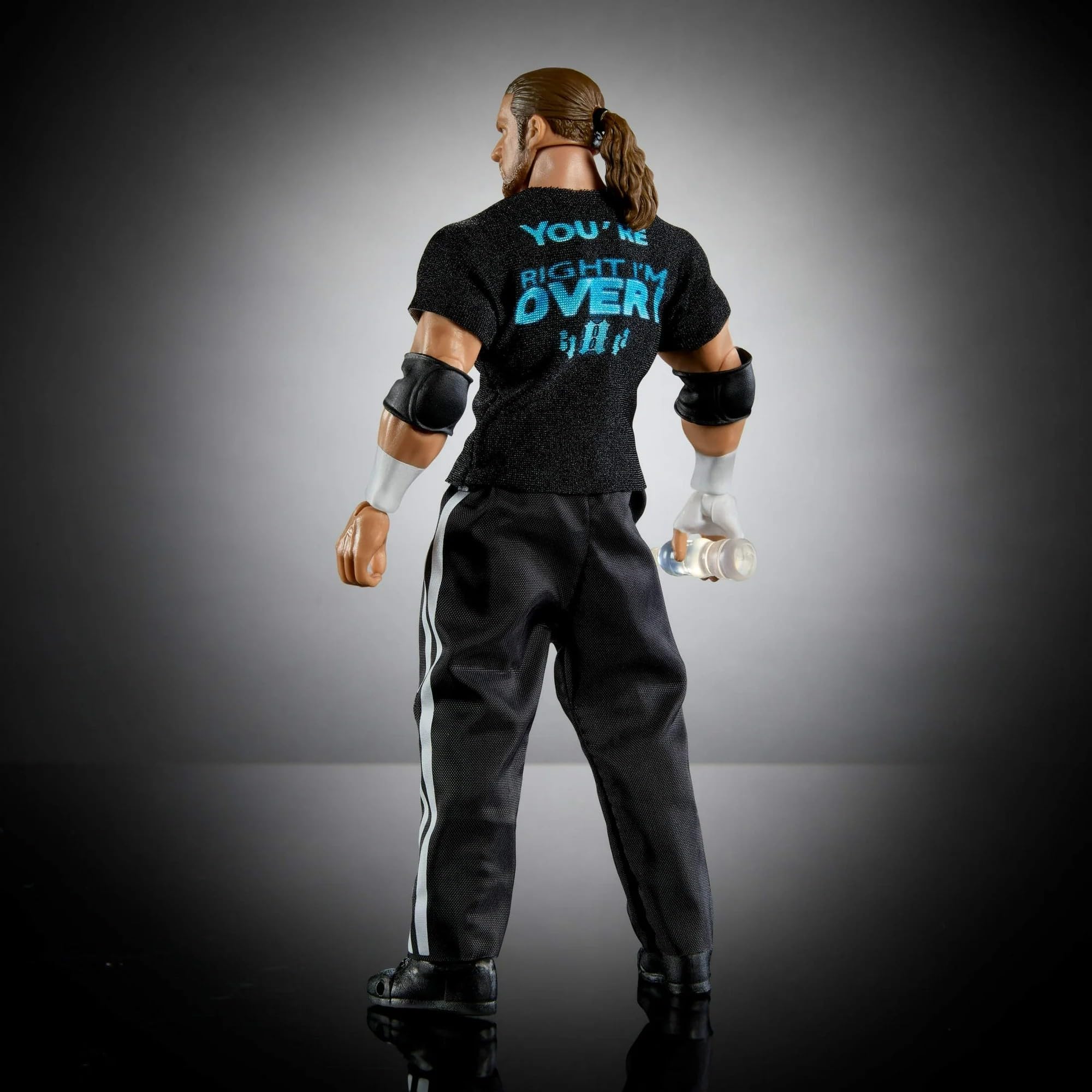 Mattel WWE Ultimate Edition packaging and accessories highlighting included items
