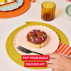 Max Build More pizza brick design for snack-themed shelves.