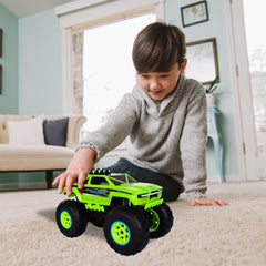 Maxx Action monster truck in motion showing fast action on the floor