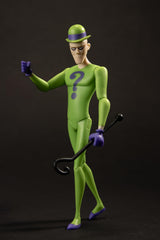 Vivid green and purple suit texture stands out on the shelf.