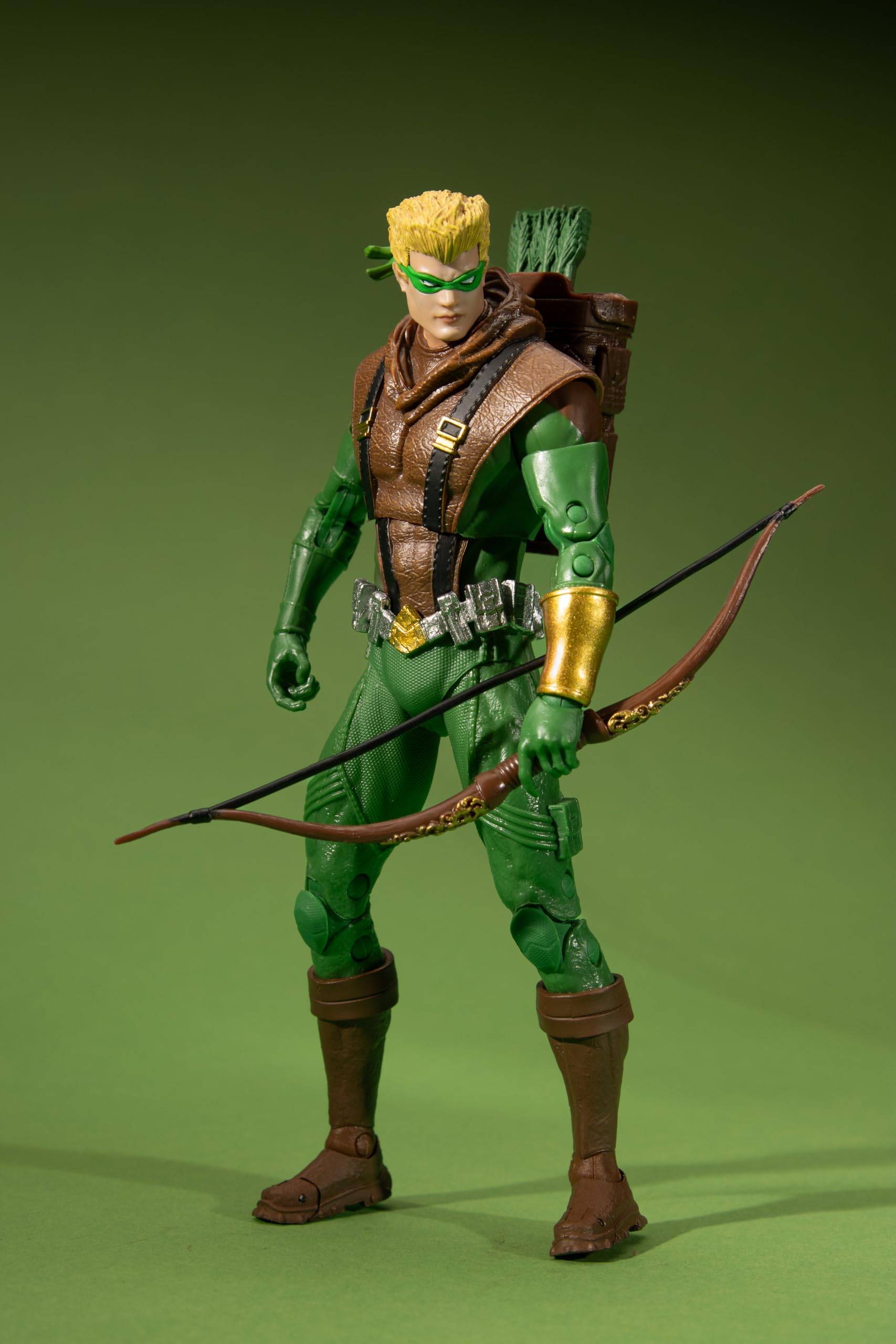 McFarlane Green Arrow accessories laid out for authentic display