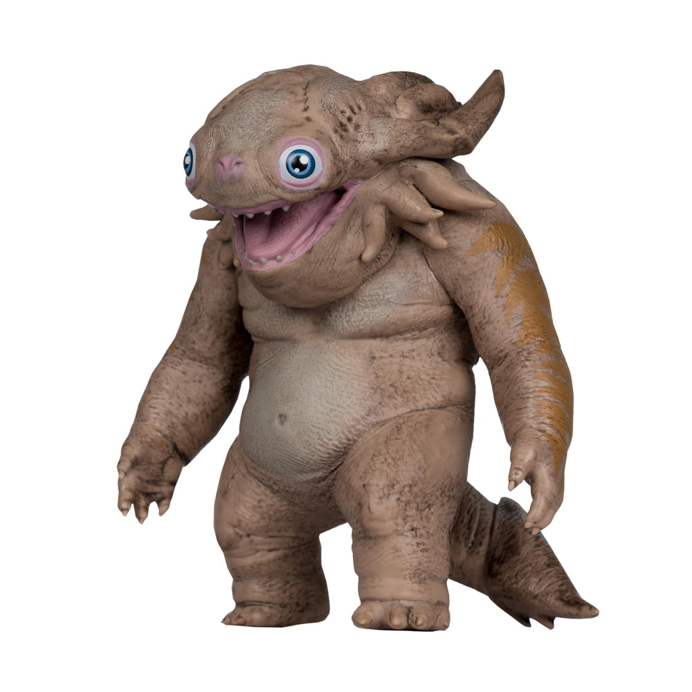 McFarlane Toys Baby Kaiju figure; scale reference fits with 4–5 inch DC collectibles.
