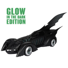 Blue glow highlights Batmobile engine panels and undercarriage in low light