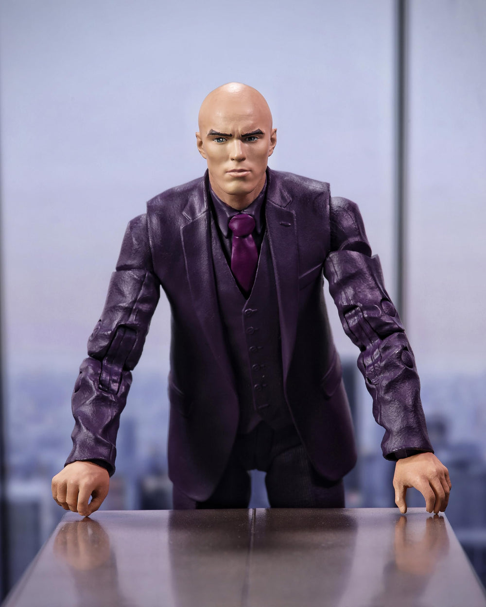 McFarlane Toys Lex Luthor with Baby Kaiju in dynamic side pose for display