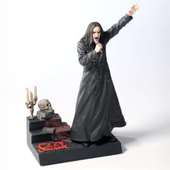 McFarlane Toys Ozzy Osbourne statue with trench coat detail for display.