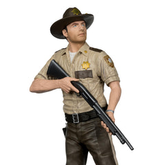 McFarlane Toys Rick Grimes posed on its display base for dynamic setups.