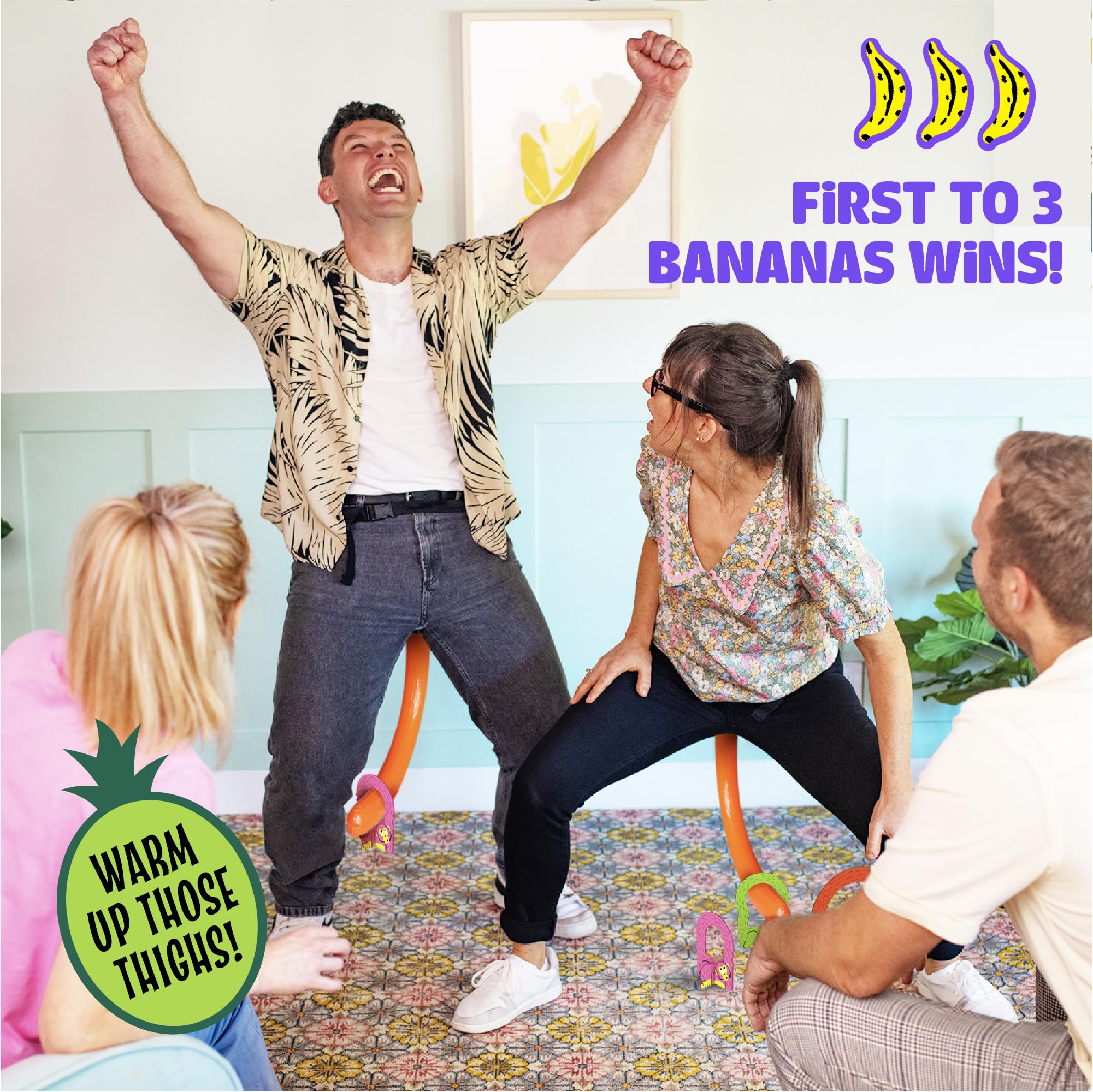 Family members laugh together during It’s Bananas gameplay at home.