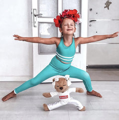 Meddy Teddy The Yoga Bear demonstrating kid yoga postures for learning.