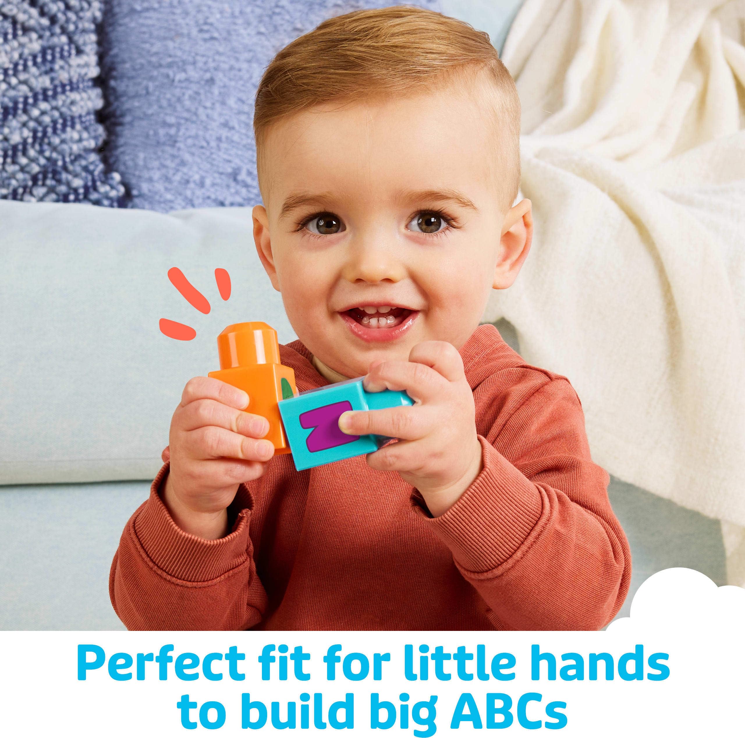Mega Bloks First Builders smokestack button triggers engaging sounds for storytelling.