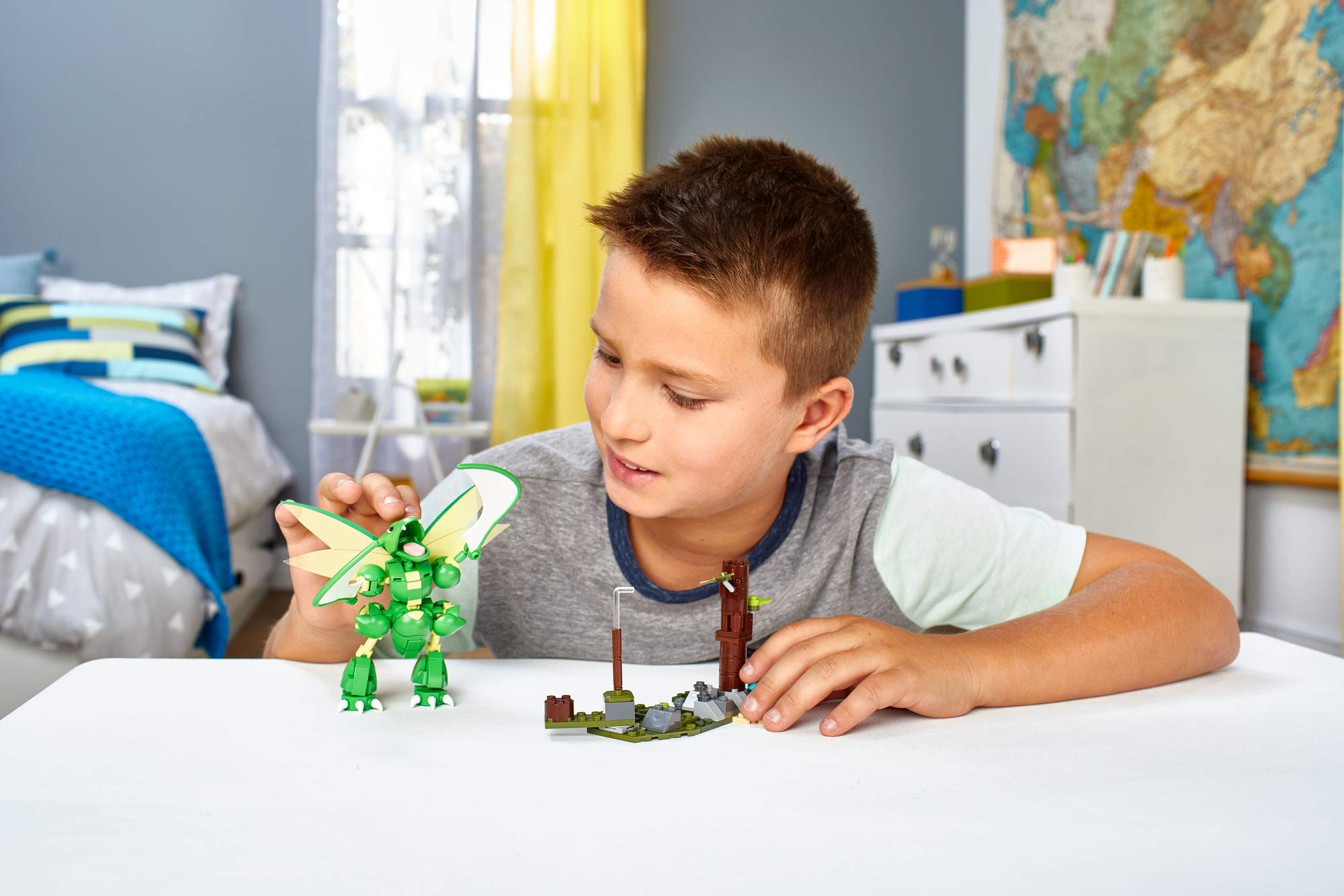Mega Construx Scyther with articulated scythes for dynamic action.