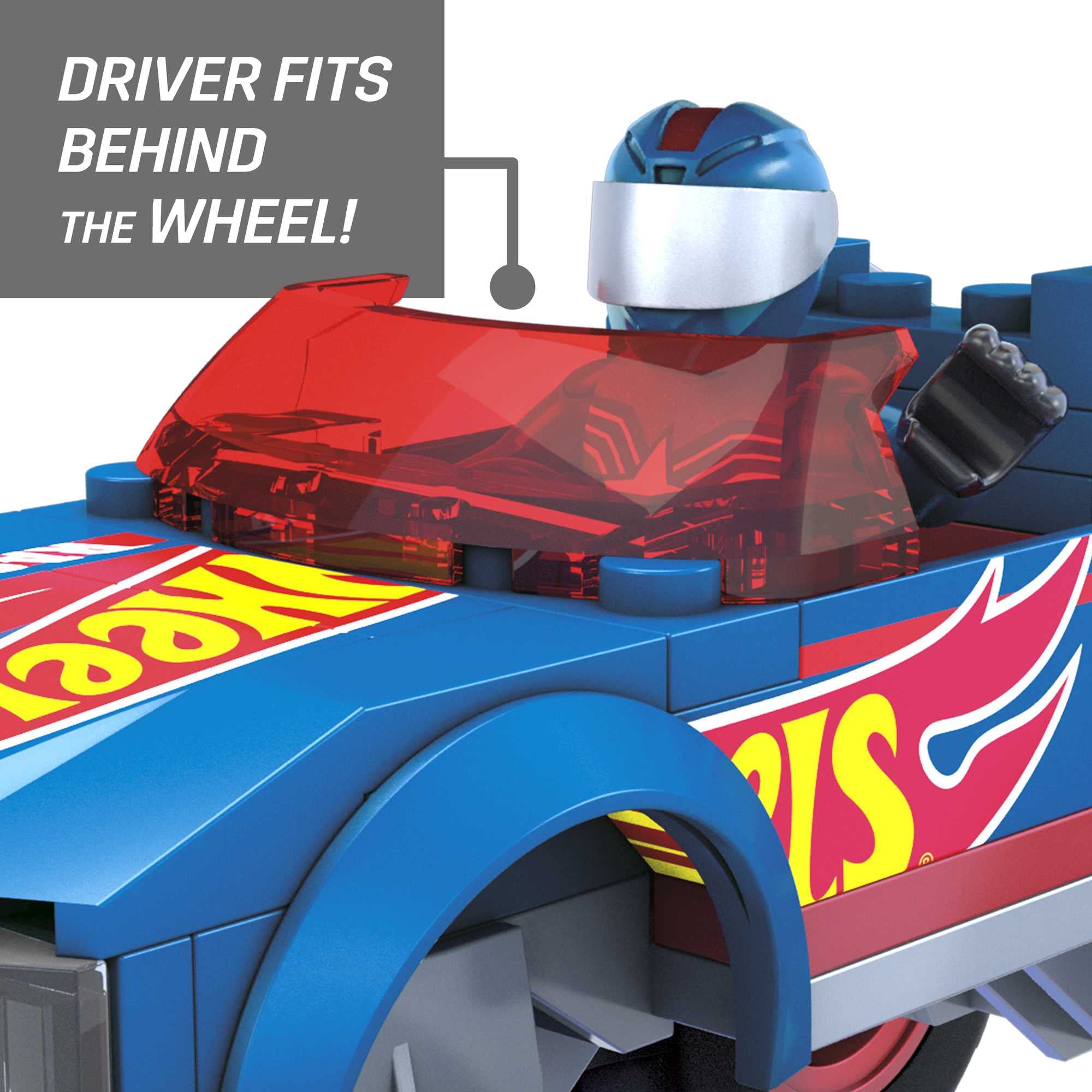 Micro action figure seated in the Race Ace cab supports detailed role-play