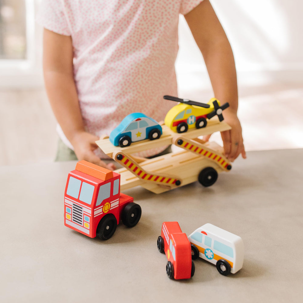 Melissa & Doug ambulance in yellow supports caring rescue narratives.