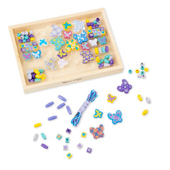 Five colored cords included for versatile bead stringing with Melissa & Doug