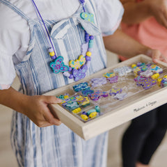 Bead sorting activity using Melissa & Doug butterfly beads