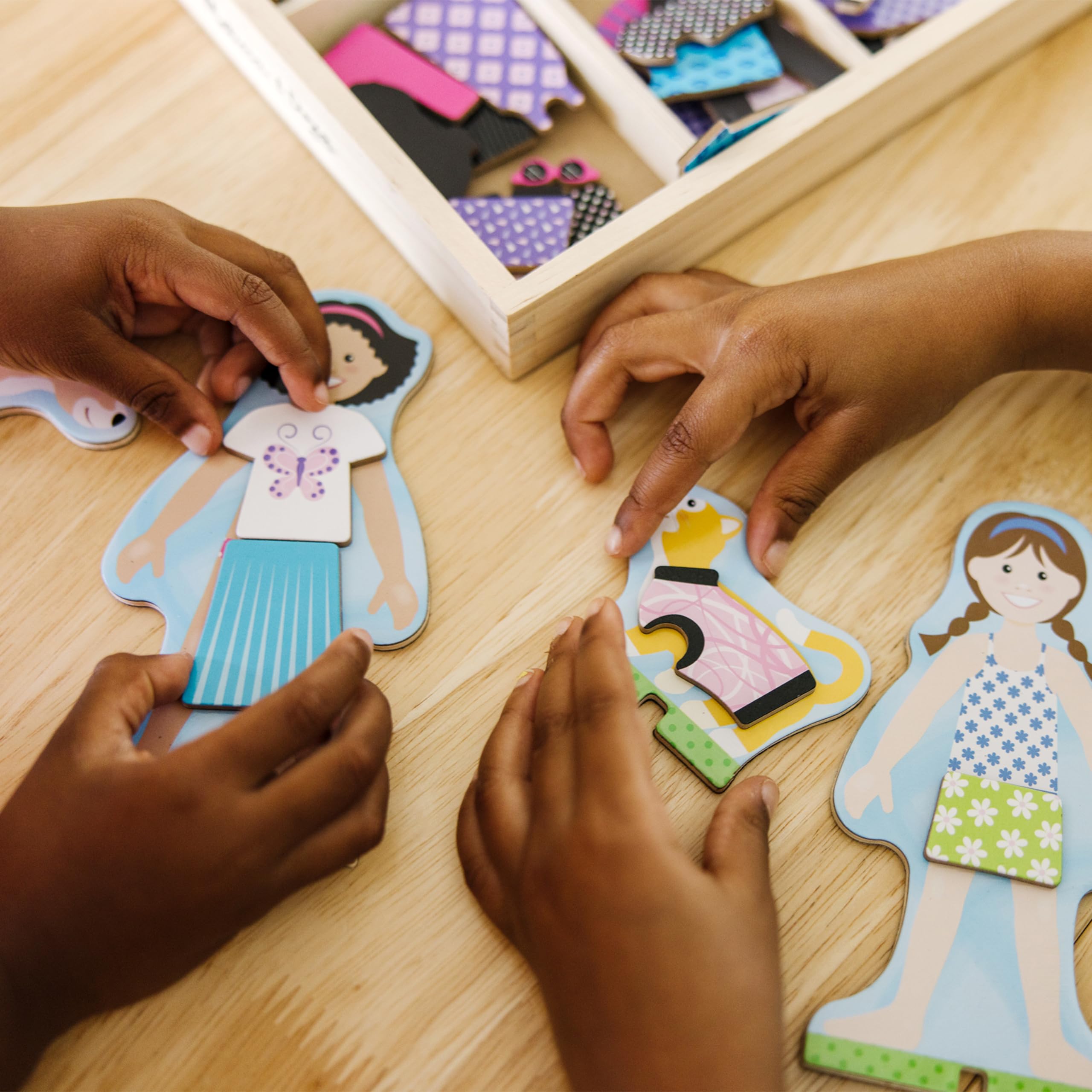 Melissa & Doug Best Friends magnetic pieces enable quick clothing swaps.