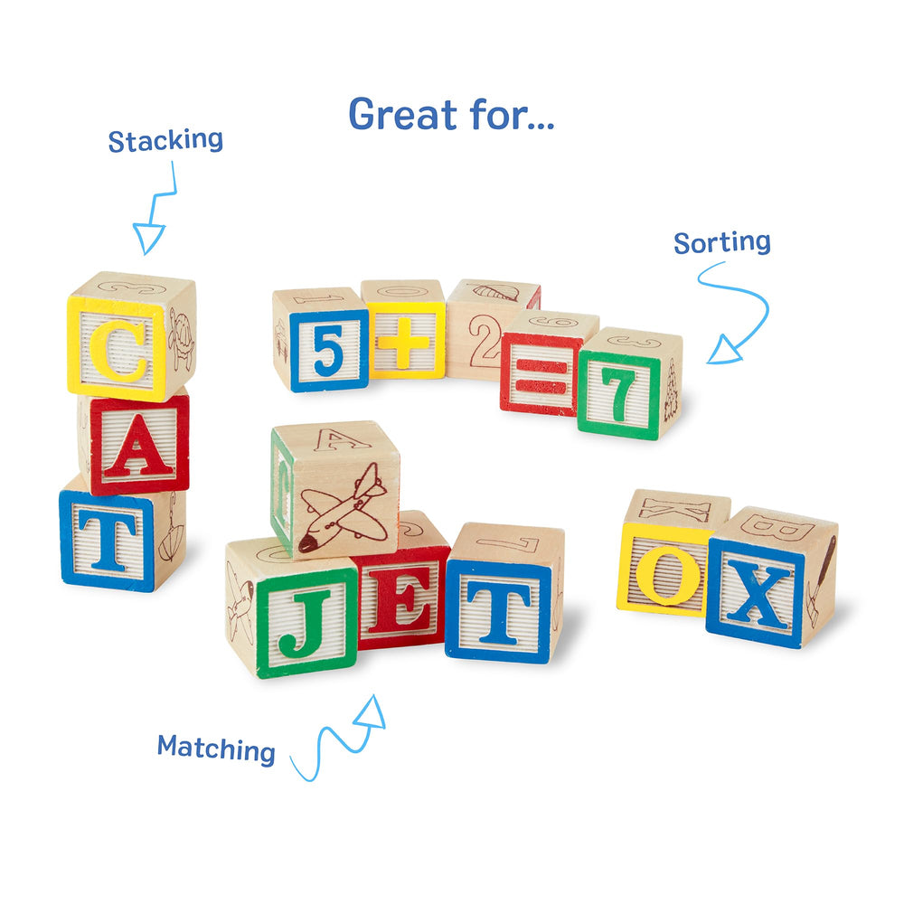 Child builds words with Melissa & Doug ABC/123 blocks.