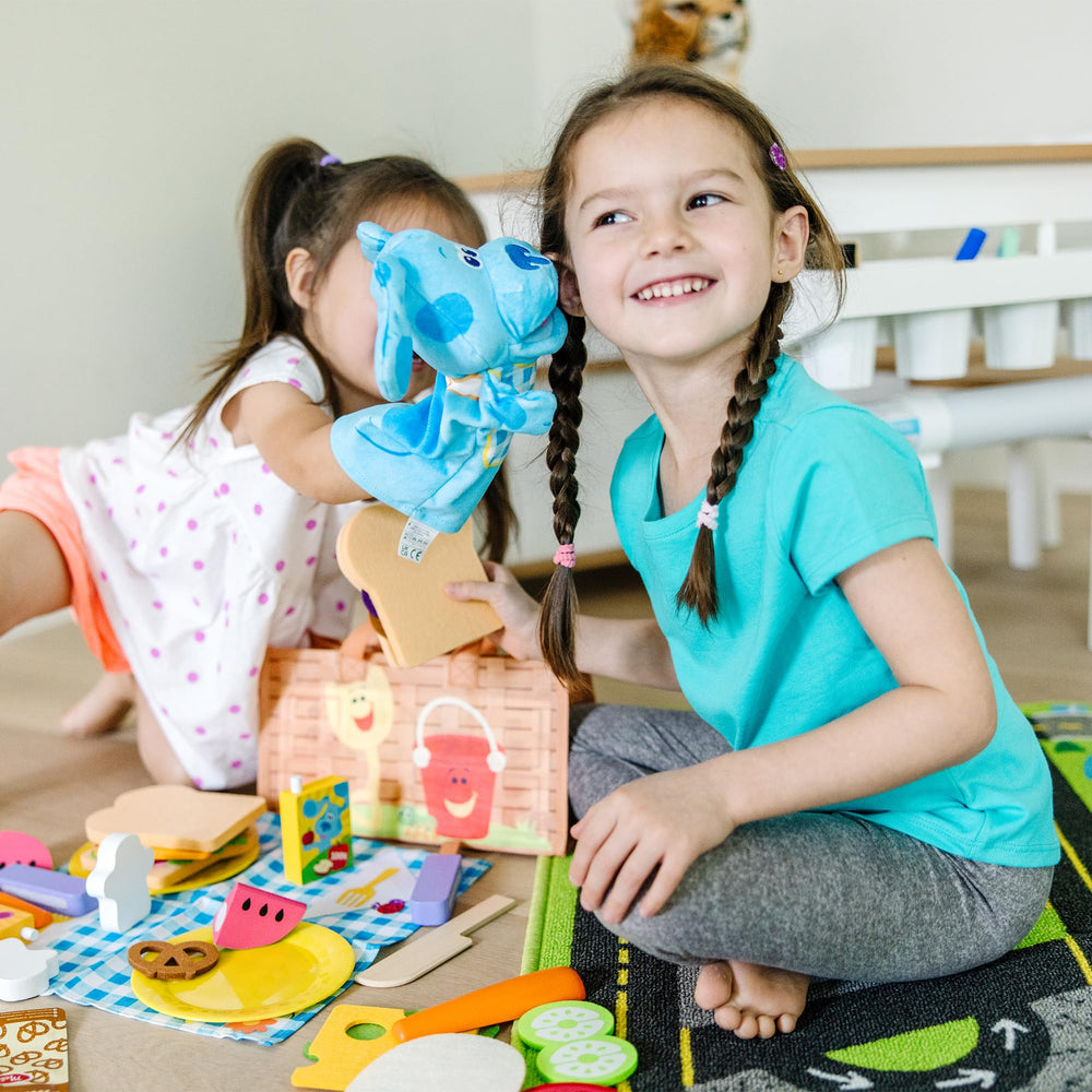 Melissa & Doug Blue hand puppet with movable mouth and floppy ears for storytelling
