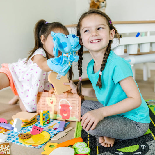 Melissa & Doug Blue hand puppet with movable mouth and floppy ears for storytelling