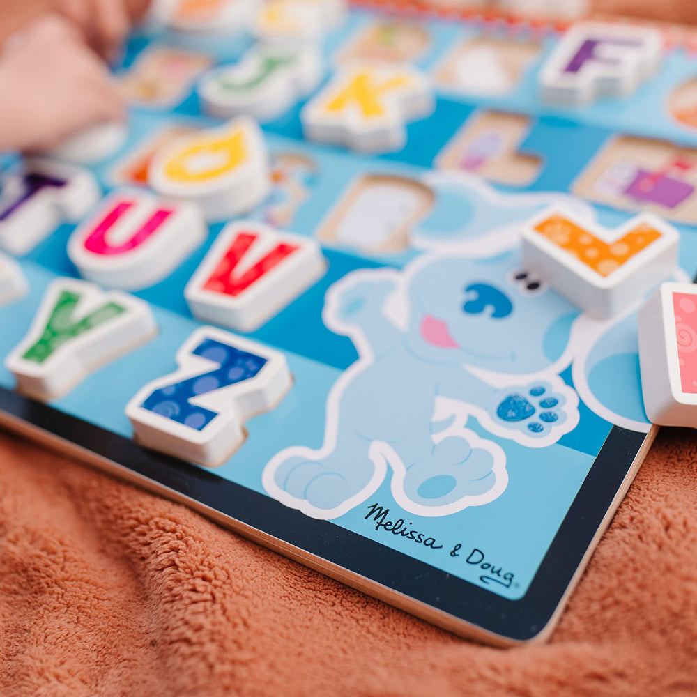 Melissa & Doug Blue's Clues & You pictures begin with letters under each piece, encouraging word connections