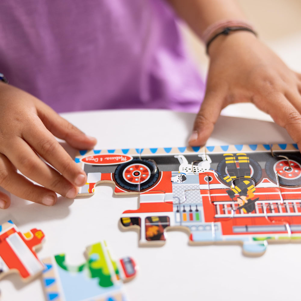 Melissa & Doug box lid doubles as a puzzle board for on-the-go play.