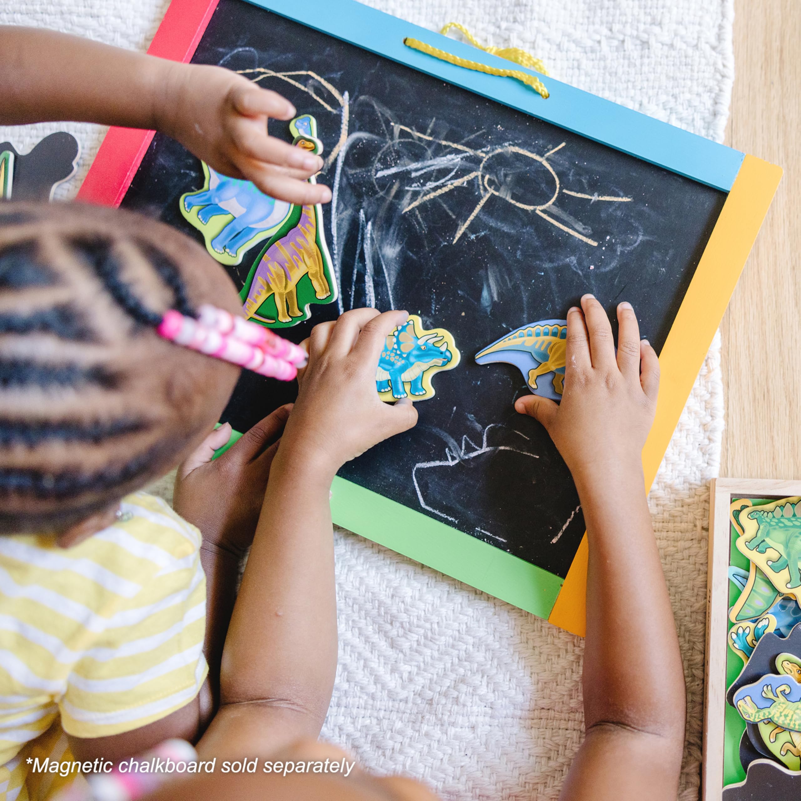 Brightly colored Melissa & Doug dinosaur magnets in display