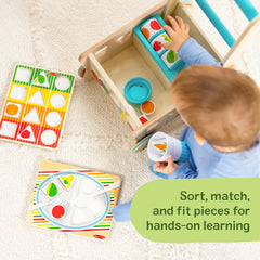 Melissa & Doug push cart supports motor skill development during pretend play.