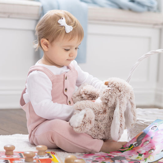 Burrow Bunny's big feet invite cuddles and imaginative play.
