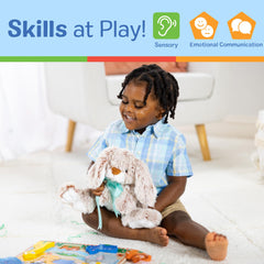 Melissa & Doug Burrow Bunny in a snuggle pose encourages pretend play.