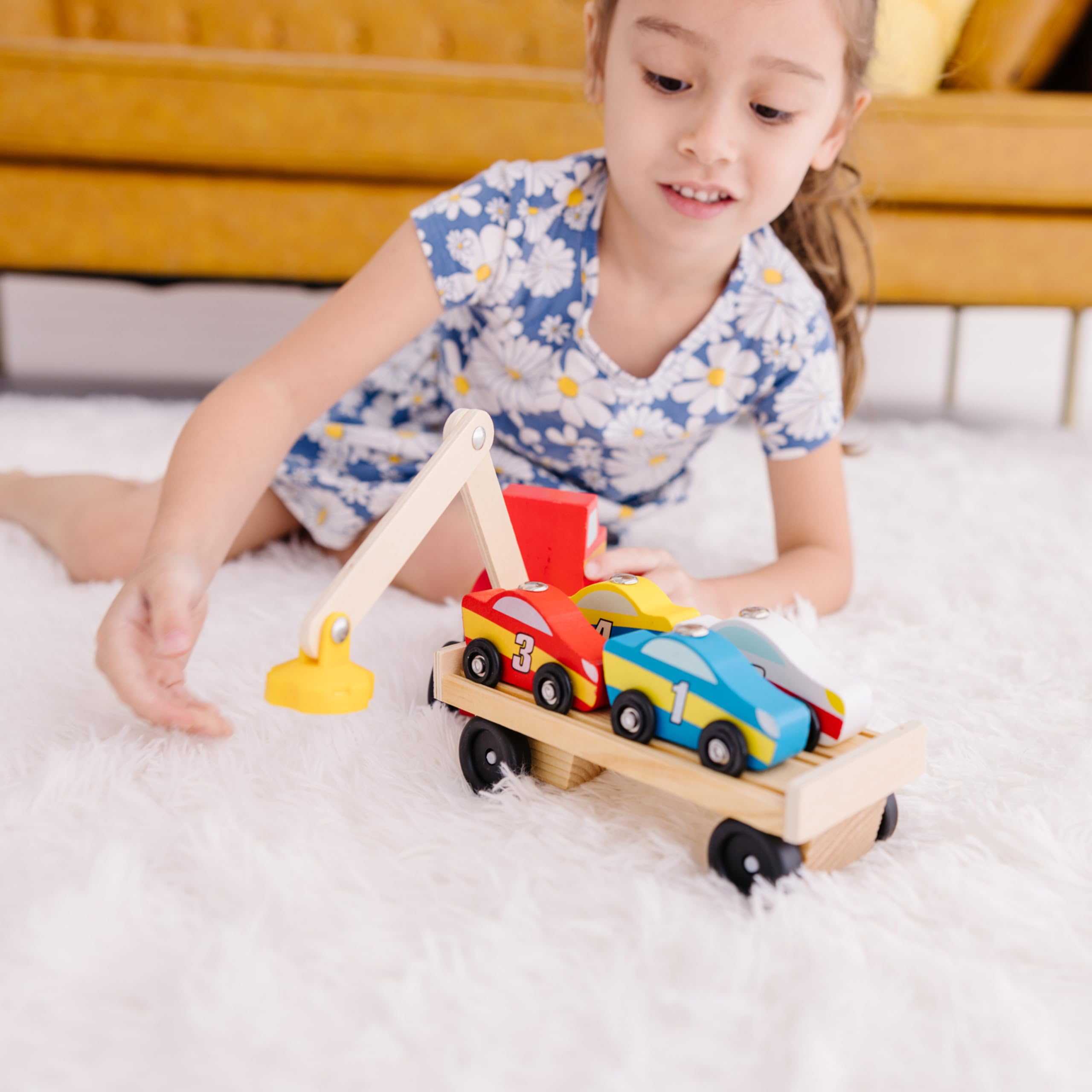 Melissa & Doug set enables counting and sequencing activities with cars