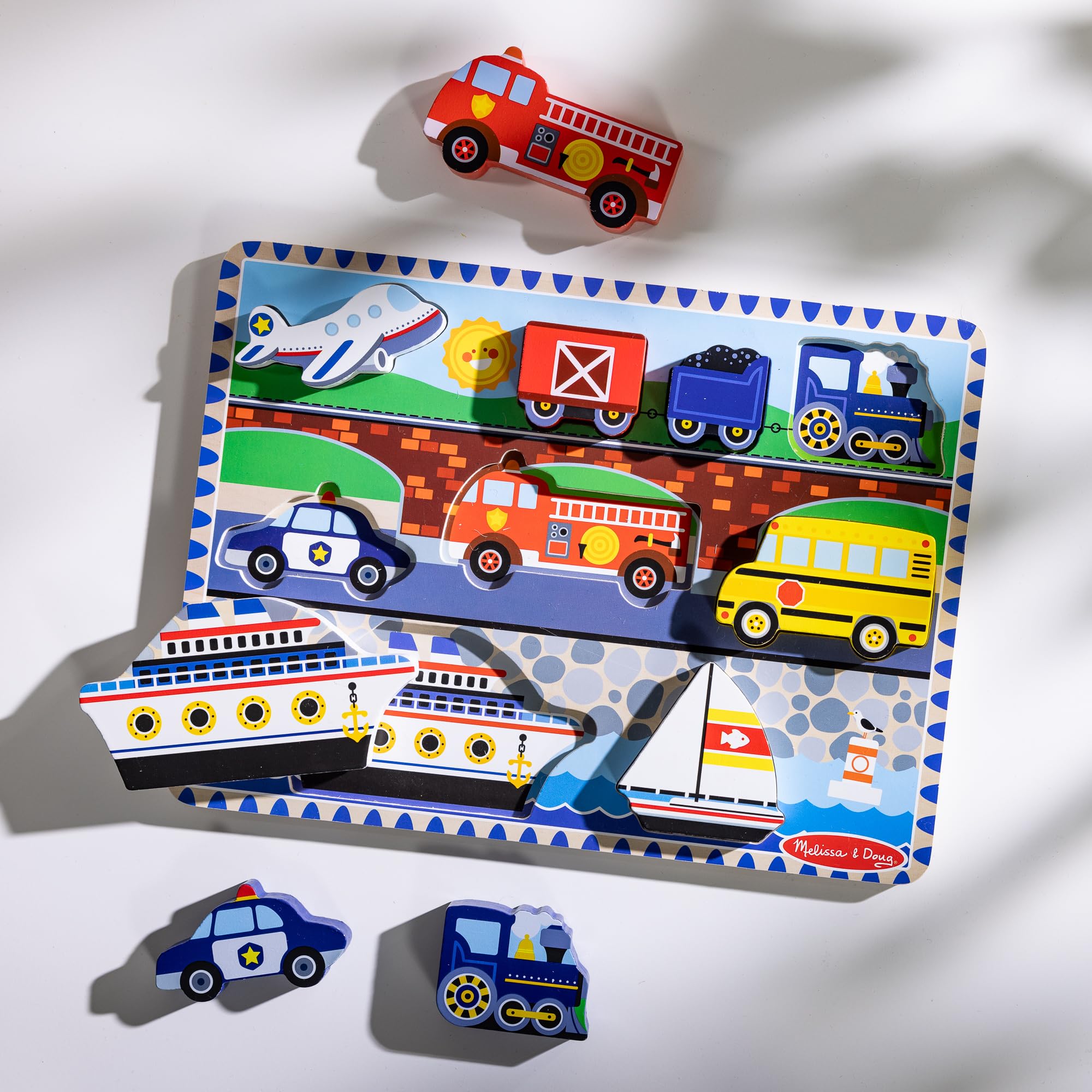 Melissa & Doug crane piece adds construction-themed pretend play and motor use