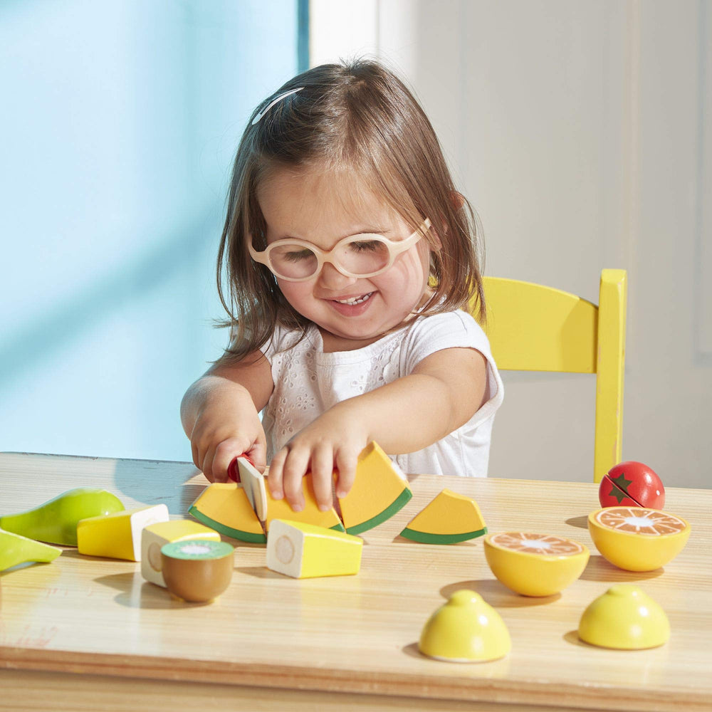 Melissa & Doug Cutting Fruit Set child-safe knife ready for safe fruit slicing play.