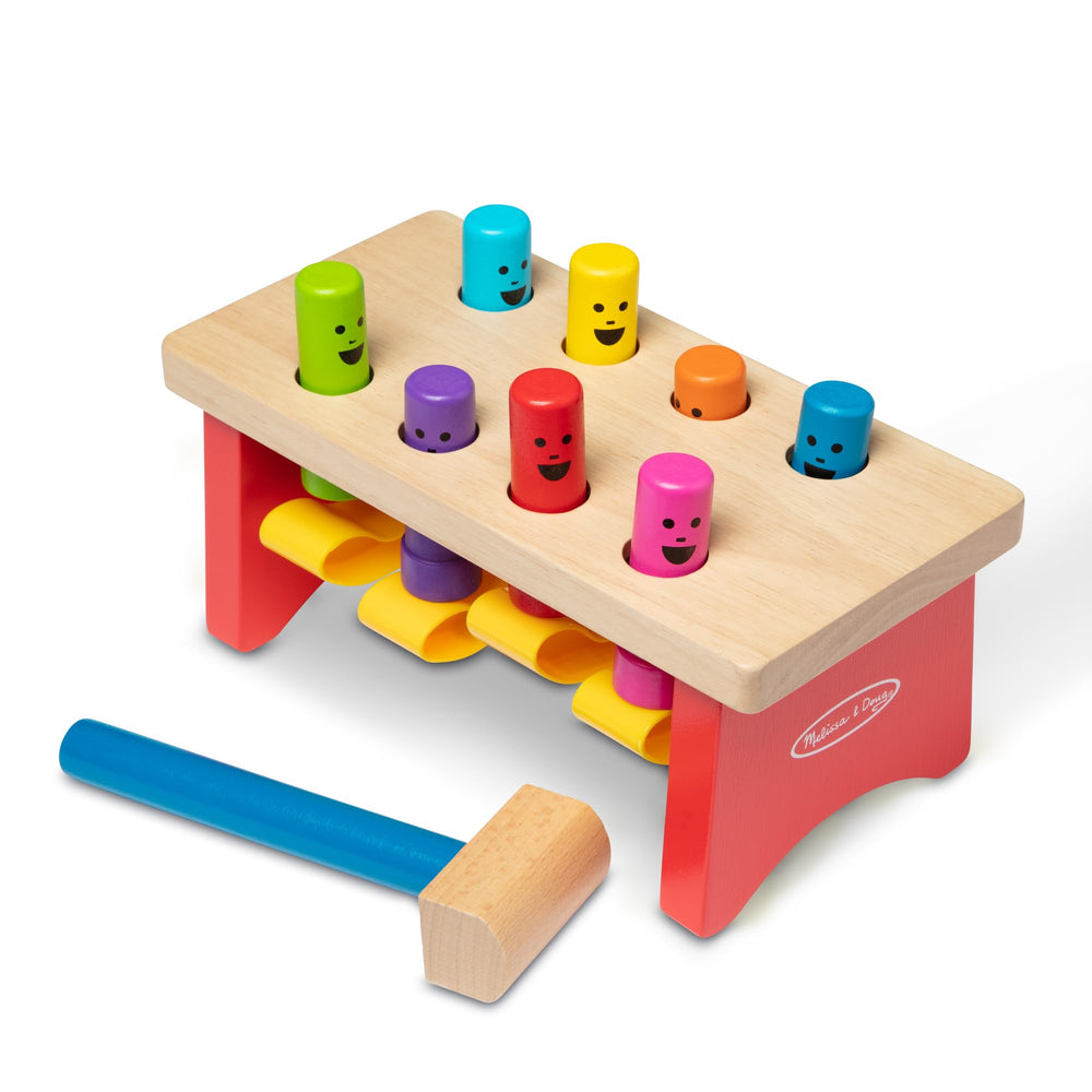 Melissa & Doug Deluxe Pounding Bench pegs perform a peekaboo reveal during play